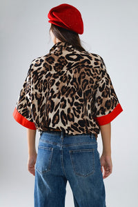 ANIMAL PRINT RED TRIM SHIRT