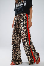 Load image into Gallery viewer, ANIMAL PRINT RED TRIM STRAIGHT PANTS