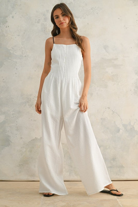 CRINKLED JUMPSUIT WITH CONTRAST STRAP